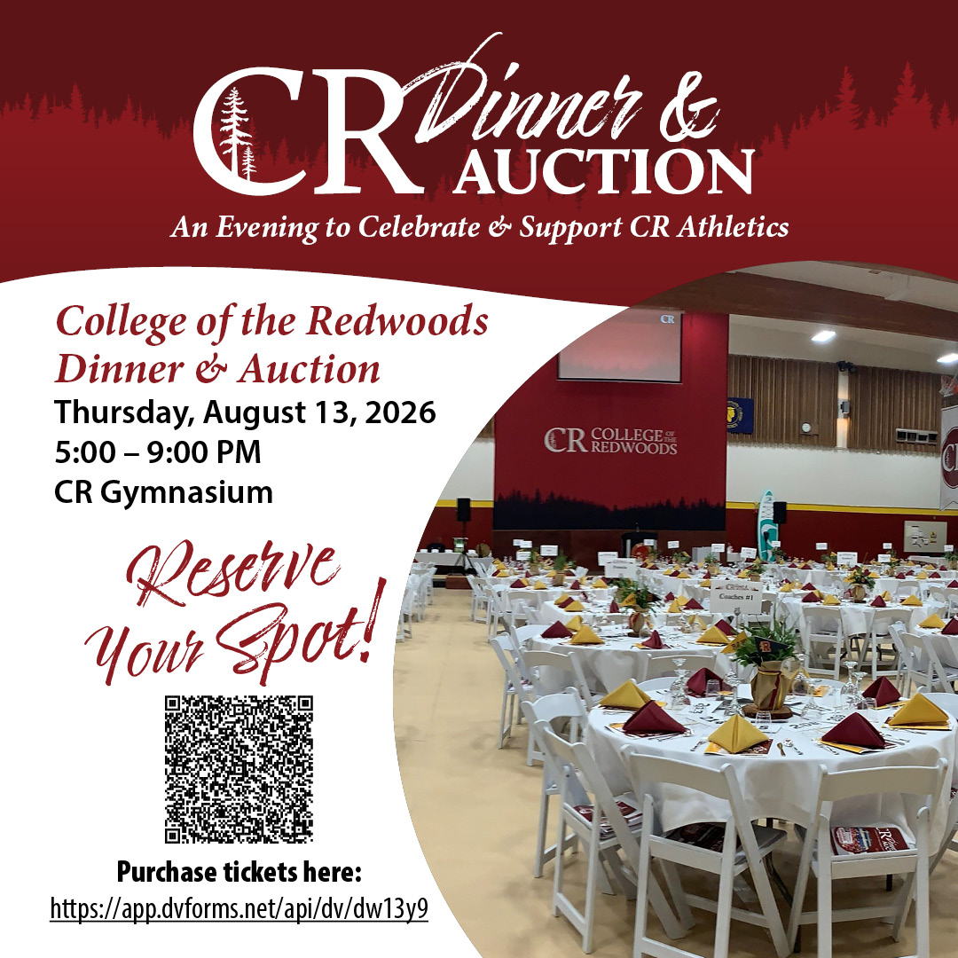 Tables set with linens and dinner setups inside of the gymnasium at CR