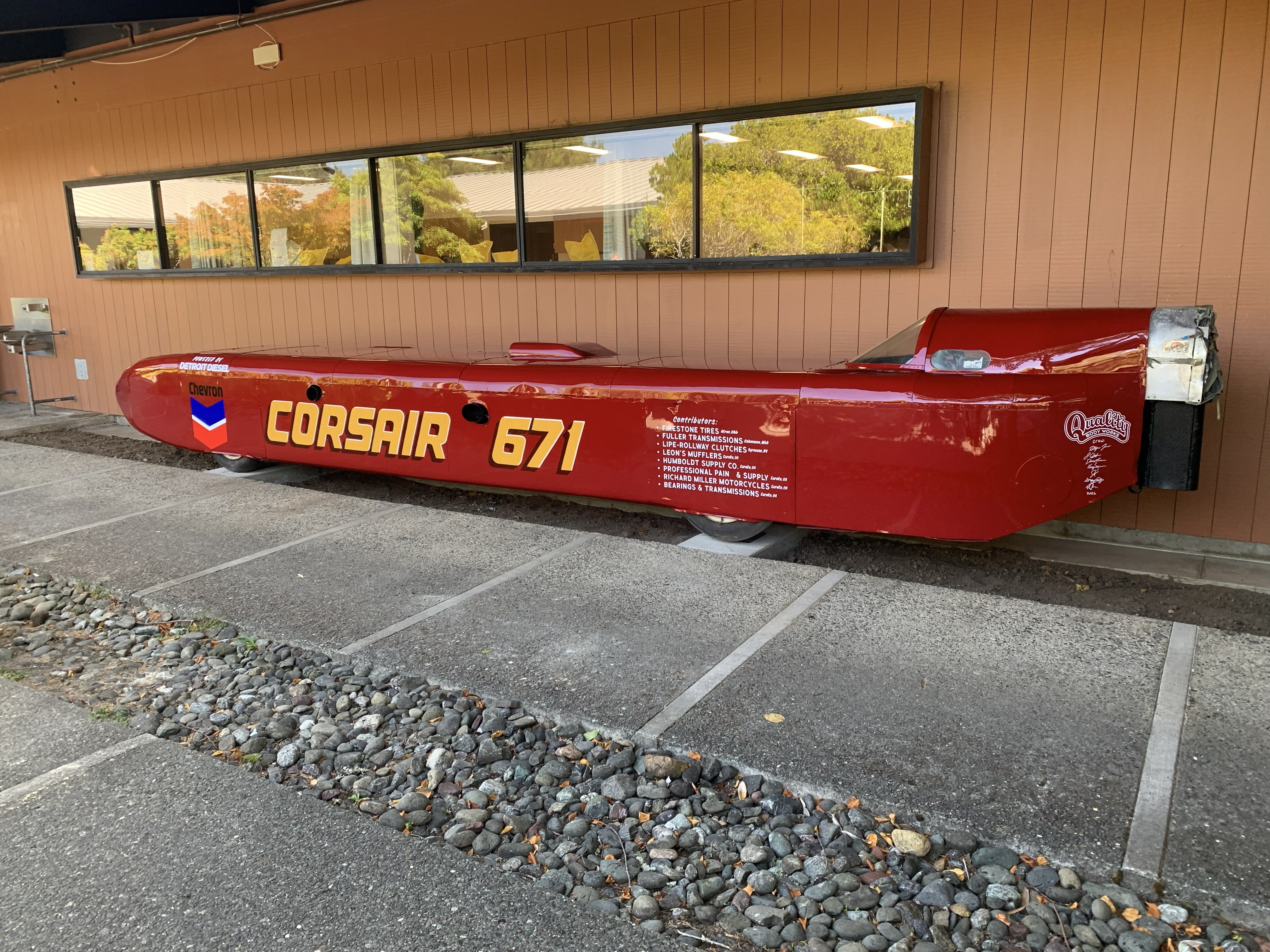 refurbished speed car re-installed in front of applied technology building on CR campus